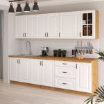 Jasne meble kuchenne Stilo w kolorach dąb artisan oraz biały idealne do kawalerki